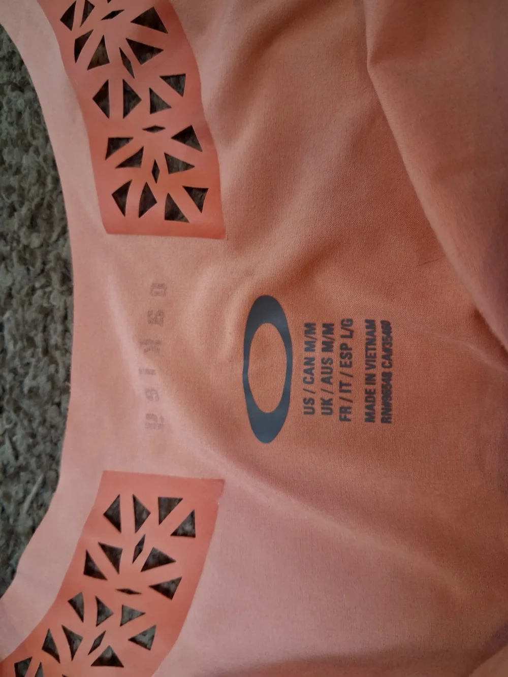 Oakley Light Coral Athletic Tank with Laser-Cut Accent - Picture 2 of 5